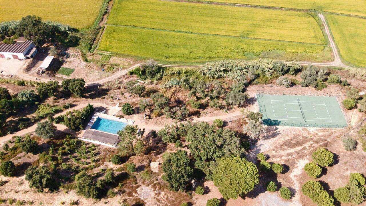 The pool and tennis court from the air