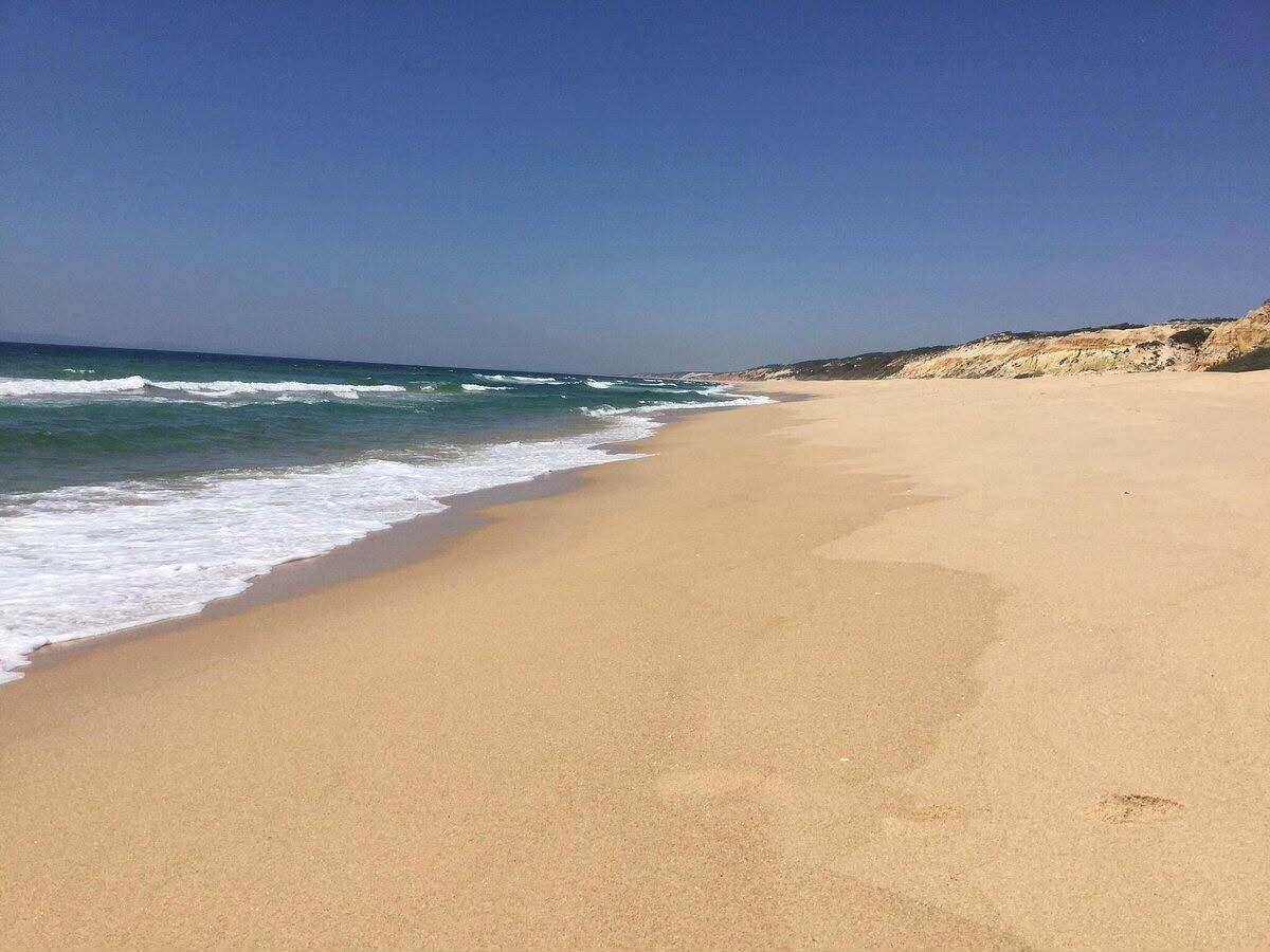 The long empty beach at Melides