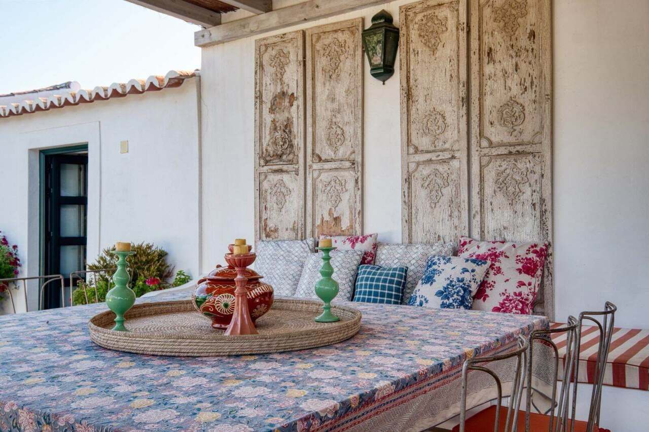 The terrace dining table, laid and shaded
