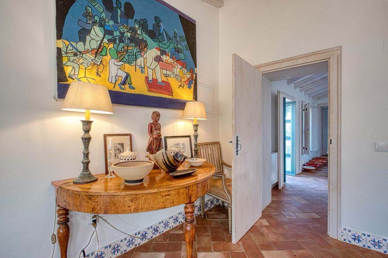 The console table with its tapestry