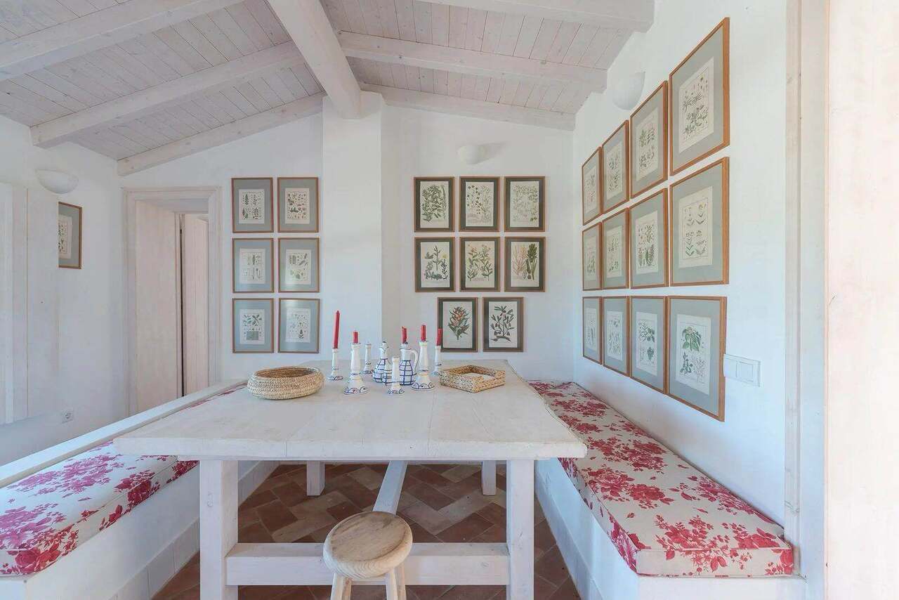 The dining nook, botanical prints above the table